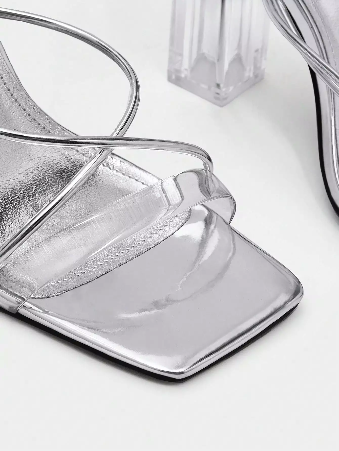 Metallic chunky heeled strappy sandals for women, perfect for glamorous parties.